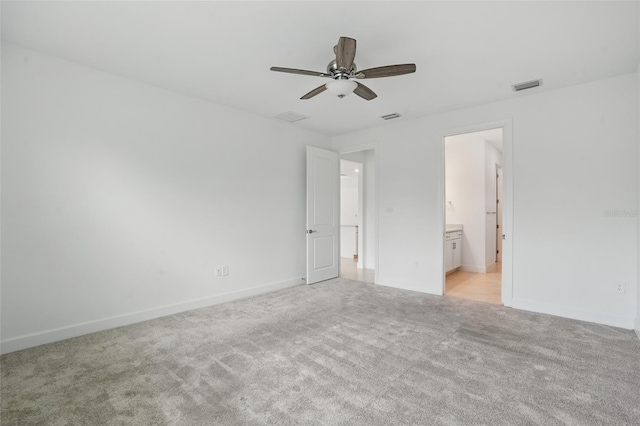 16053 Rosemallow Ln, Alva, FL 33920 - unfurnished bedroom with light carpet, baseboards, and ensuite bath