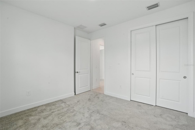 16053 Rosemallow Ln, Alva, FL 33920 - unfurnished bedroom with carpet, baseboards, and a closet