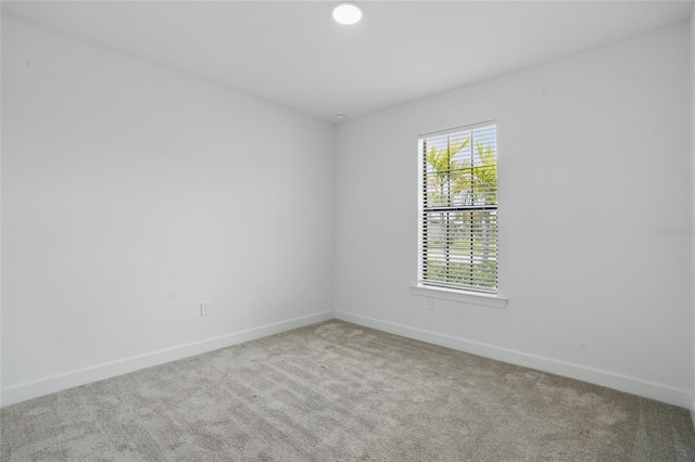 16053 Rosemallow Ln, Alva, FL 33920 - spare room with carpet floors and baseboards