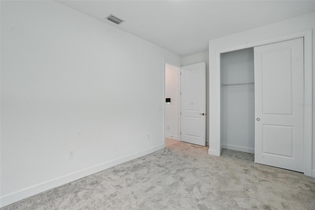 16053 Rosemallow Ln, Alva, FL 33920 - unfurnished bedroom with carpet floors, baseboards, and a closet