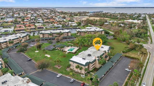 601 Shreve St Unit 64C, Punta Gorda, FL 33950 - aerial view of property and surrounding area featuring a large body of water and nearby suburban area