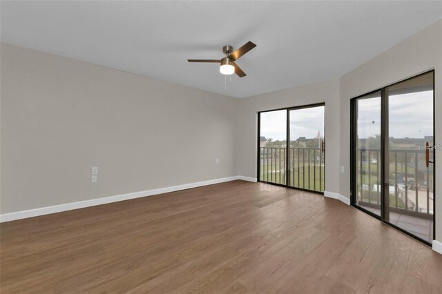 601 Shreve St Unit 64C, Punta Gorda, FL 33950 - unfurnished room with wood finished floors, baseboards, and ceiling fan