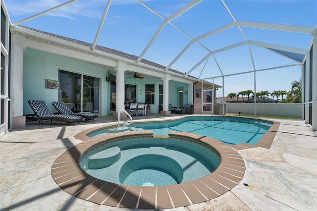 3219 SW 7th Ln, Cape Coral, FL 33991 - view of pool featuring a patio area, a ceiling fan, a pool with connected hot tub, and a lanai