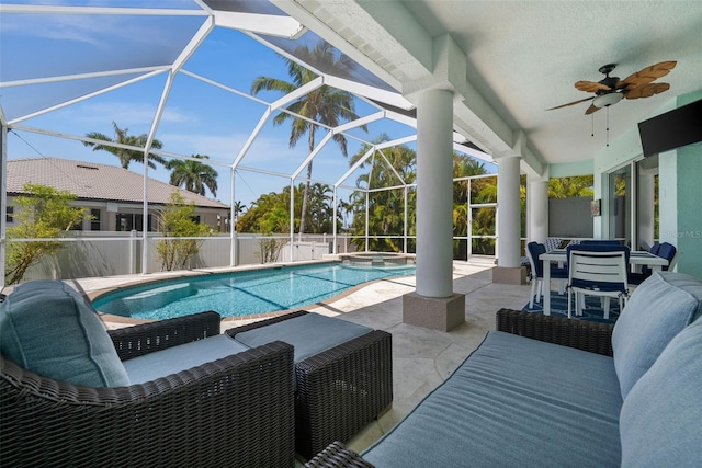 3219 SW 7th Ln, Cape Coral, FL 33991 - view of pool with a patio, a ceiling fan, a pool with connected hot tub, and a lanai