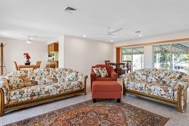 125 Small St SE, Port Charlotte, FL 33952 - carpeted living area featuring ceiling fan and recessed lighting