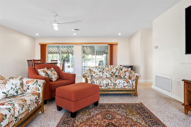 125 Small St SE, Port Charlotte, FL 33952 - carpeted living area featuring baseboards and recessed lighting