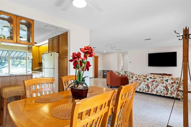 125 Small St SE, Port Charlotte, FL 33952 - dining area with ceiling fan