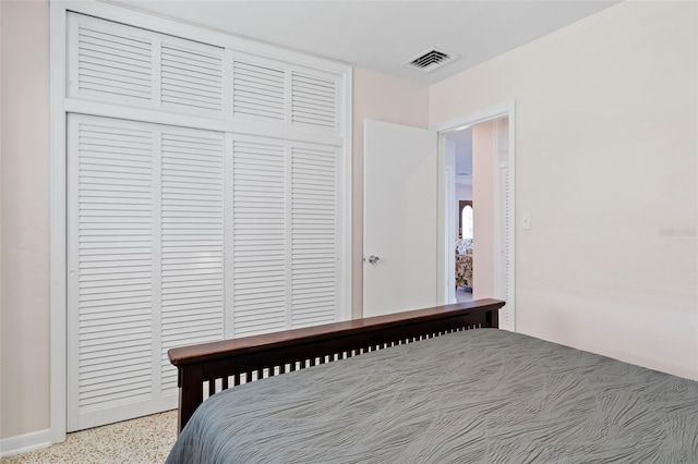 125 Small St SE, Port Charlotte, FL 33952 - bedroom featuring a closet and speckled floor
