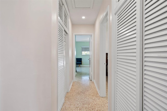 125 Small St SE, Port Charlotte, FL 33952 - hallway with baseboards, dark aggregate flooring, and recessed lighting