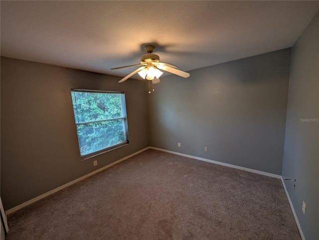 4205 Simkins Ave, North Port, FL 34286 - spare room with a ceiling fan, dark colored carpet, and baseboards