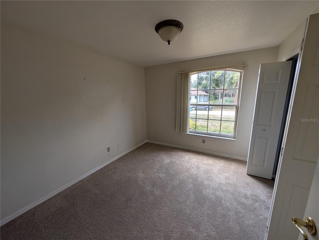 4205 Simkins Ave, North Port, FL 34286 - carpeted spare room featuring baseboards