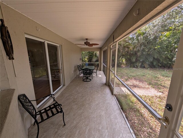 4205 Simkins Ave, North Port, FL 34286 - sunroom / solarium featuring a ceiling fan and outdoor dining space