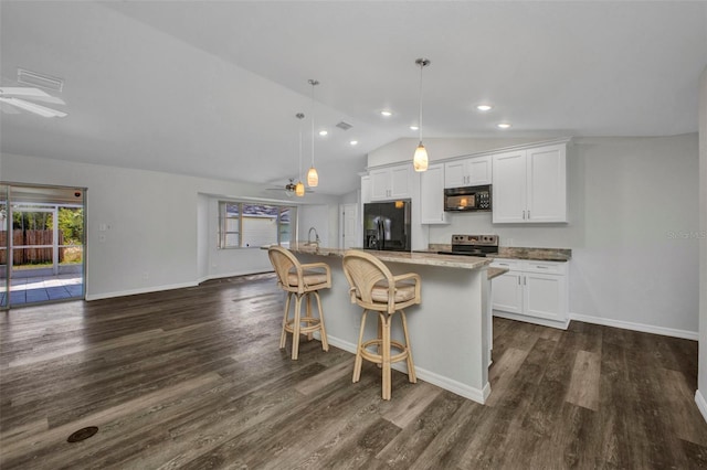 1210 Mccrory St, North Port, FL 34286 - kitchen featuring black appliances, a ceiling fan, lofted ceiling, baseboards, and recessed lighting