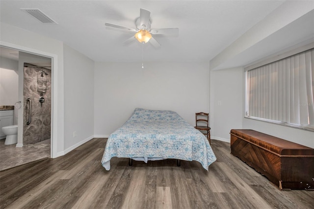 1210 Mccrory St, North Port, FL 34286 - bedroom with wood finished floors, baseboards, and a ceiling fan