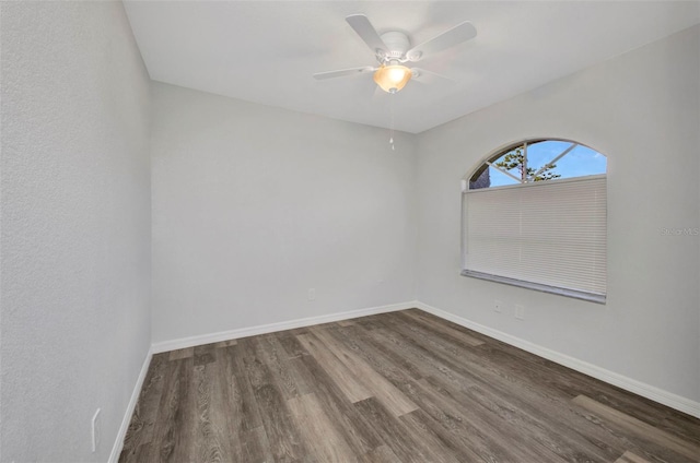1210 Mccrory St, North Port, FL 34286 - spare room featuring wood finished floors, baseboards, and a ceiling fan