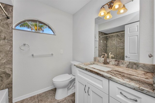 1210 Mccrory St, North Port, FL 34286 - full bathroom featuring a tile shower, vanity, toilet, baseboards, and tile patterned floors