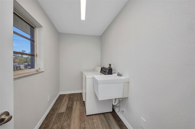 1210 Mccrory St, North Port, FL 34286 - laundry room featuring dark wood-style floors, baseboards, and washer and dryer
