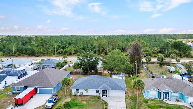 1210 Mccrory St, North Port, FL 34286 - aerial perspective of suburban area featuring a forest