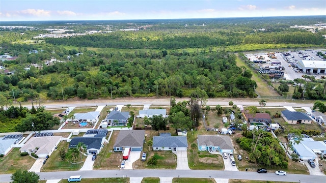 1210 Mccrory St, North Port, FL 34286 - aerial perspective of suburban area with a forest