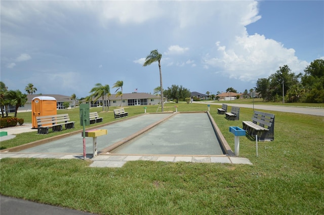 12538 SW Kingsway Cir Unit 1602, Lake Suzy, FL 34269 - view of property's community with a bocce ball area, a lawn, and a residential view