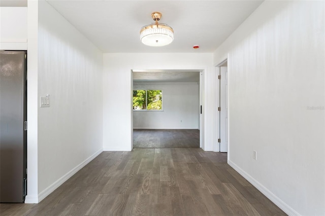 1231 Beacon Dr, Port Charlotte, FL 33952 - hall featuring wood finished floors and baseboards