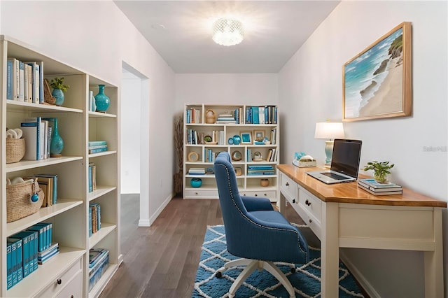 1231 Beacon Dr, Port Charlotte, FL 33952 - home office featuring dark wood-style floors and baseboards