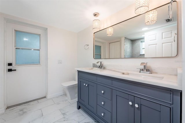 1231 Beacon Dr, Port Charlotte, FL 33952 - bathroom with marble look tiles, double vanity, toilet, baseboards, and a chandelier