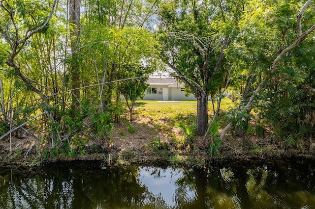 1231 Beacon Dr, Port Charlotte, FL 33952 - view of grassy yard with a water view