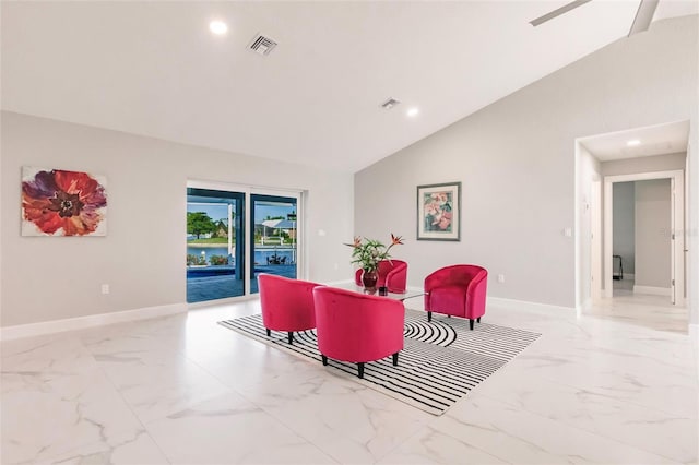 261 Venezia Ct, Punta Gorda, FL 33950 - living room with marble look tile flooring, vaulted ceiling, baseboards, recessed lighting, and a ceiling fan