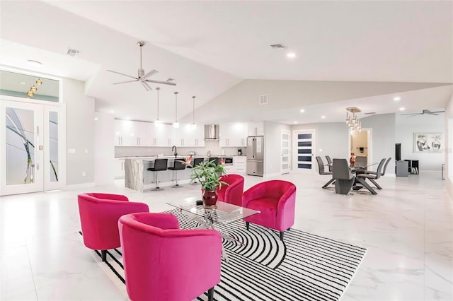 261 Venezia Ct, Punta Gorda, FL 33950 - living room with a ceiling fan, light marble finish floors, french doors, recessed lighting, and high vaulted ceiling