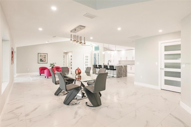 261 Venezia Ct, Punta Gorda, FL 33950 - dining space with baseboards, light marble finish floors, and recessed lighting