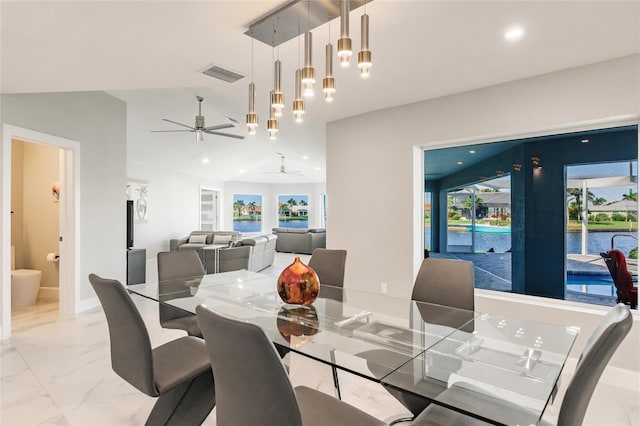 261 Venezia Ct, Punta Gorda, FL 33950 - dining space featuring ceiling fan, plenty of natural light, recessed lighting, and light marble finish flooring