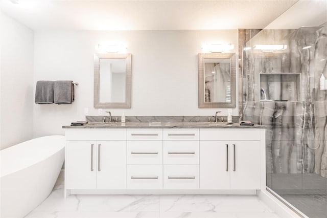 261 Venezia Ct, Punta Gorda, FL 33950 - full bathroom with marble finish floors, double vanity, a shower stall, and a soaking tub