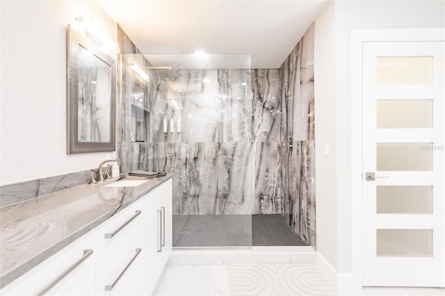 261 Venezia Ct, Punta Gorda, FL 33950 - bathroom with marble look tiles, vanity, and a marble finish shower