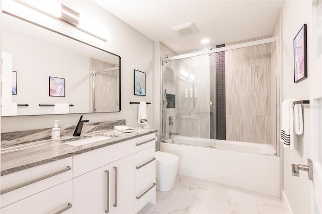 261 Venezia Ct, Punta Gorda, FL 33950 - full bath featuring vanity, marble finish floors, enclosed tub / shower combo, and toilet
