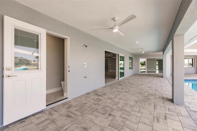 261 Venezia Ct, Punta Gorda, FL 33950 - view of patio featuring ceiling fan and a pool