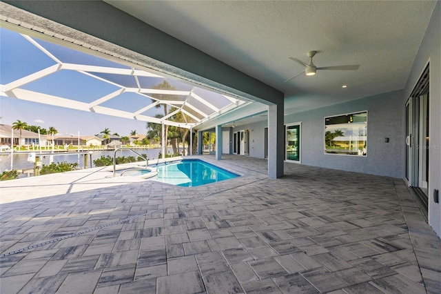 261 Venezia Ct, Punta Gorda, FL 33950 - view of pool featuring ceiling fan, a patio area, a pool with connected hot tub, and glass enclosure