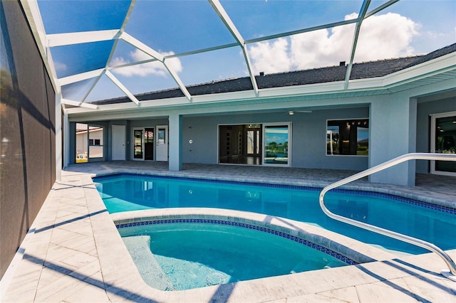 261 Venezia Ct, Punta Gorda, FL 33950 - outdoor pool featuring an in-ground hot tub, a patio area, and glass enclosure
