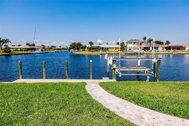 261 Venezia Ct, Punta Gorda, FL 33950 - dock with a residential view, a lawn, a water view, and boat lift