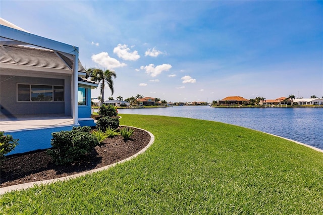 261 Venezia Ct, Punta Gorda, FL 33950 - view of grassy yard with a water view and a residential view