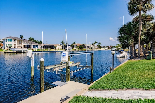 261 Venezia Ct, Punta Gorda, FL 33950 - dock area with boat lift, a water view, and a residential view