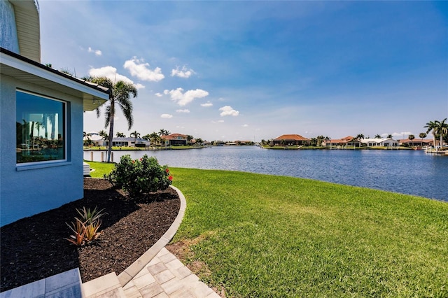 261 Venezia Ct, Punta Gorda, FL 33950 - view of green lawn with a water view and a residential view