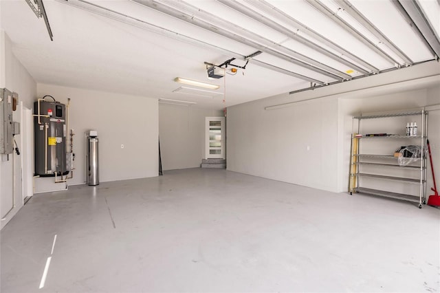261 Venezia Ct, Punta Gorda, FL 33950 - garage with water heater and a garage door opener