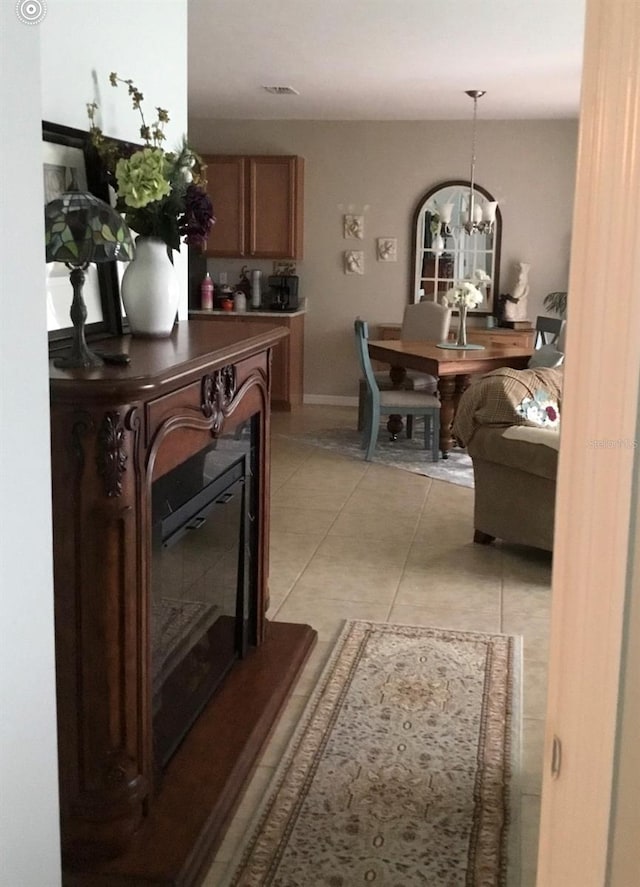 25008 Lalique Pl, Punta Gorda, FL 33950 - hallway featuring light tile patterned floors