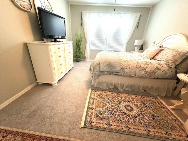 25008 Lalique Pl, Punta Gorda, FL 33950 - bedroom featuring light carpet and baseboards