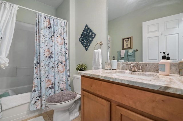 25008 Lalique Pl, Punta Gorda, FL 33950 - bathroom featuring toilet, vanity, shower / bath combo, and tile patterned flooring