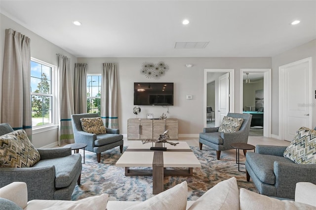 25008 Lalique Pl, Punta Gorda, FL 33950 - living room with baseboards and recessed lighting