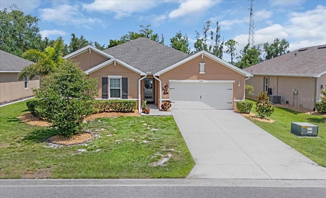 7652 Mikasa Dr, Punta Gorda, FL 33950 - single story home featuring an attached garage, driveway, a front yard, stucco siding, and central AC