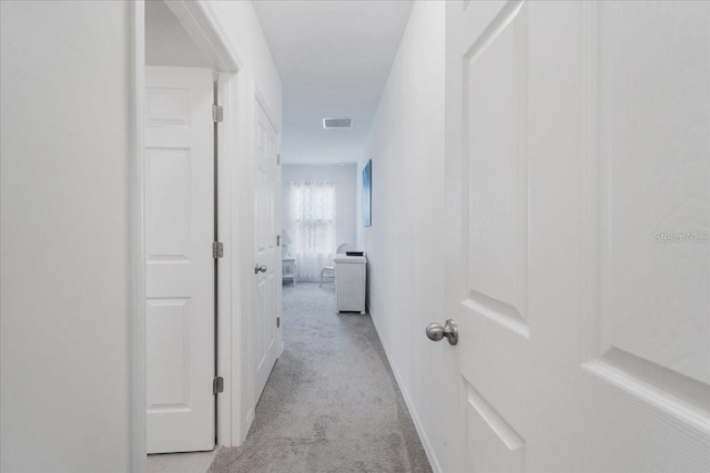 7652 Mikasa Dr, Punta Gorda, FL 33950 - hallway with light colored carpet
