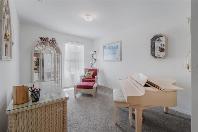7652 Mikasa Dr, Punta Gorda, FL 33950 - sitting room featuring carpet floors and baseboards
